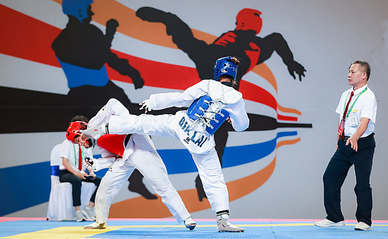  Một trận đấu tại Giải vô địch taekwondo các lứa tuổi trẻ quốc gia - CJ 2022. Ảnh: Bùi Lượng