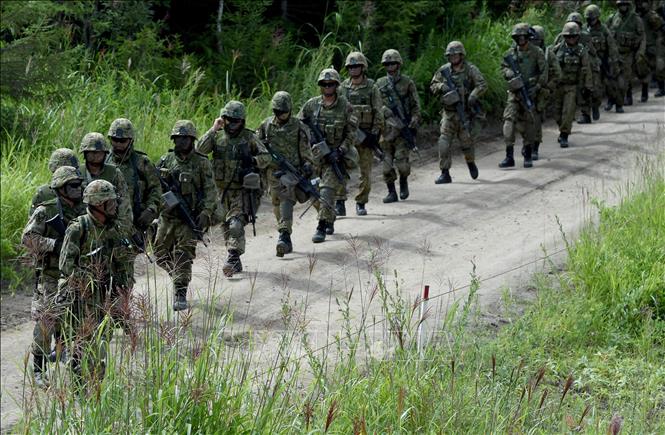  Binh sĩ Nhật Bản và Mỹ tham gia cuộc tập trận chung tại Eniwa, Hokkaido, Nhật Bản. Ảnh tư liệu: AFP/TTXVN