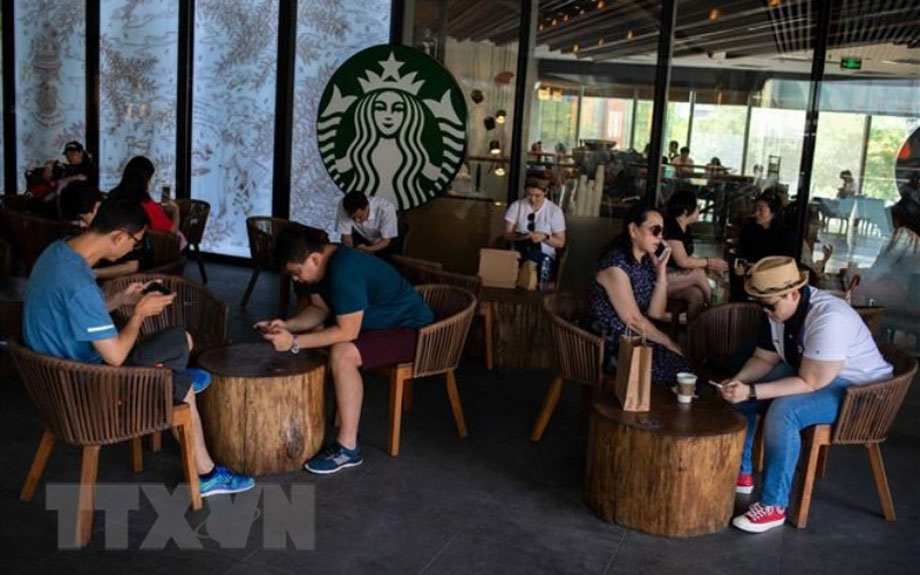  Một cửa hàng của Starbucks ở Bắc Kinh, Trung Quốc. (Ảnh: AFP/TTXVN)